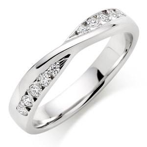Wedding Ring With Round Stones In 1.00 Carat Total Weight.